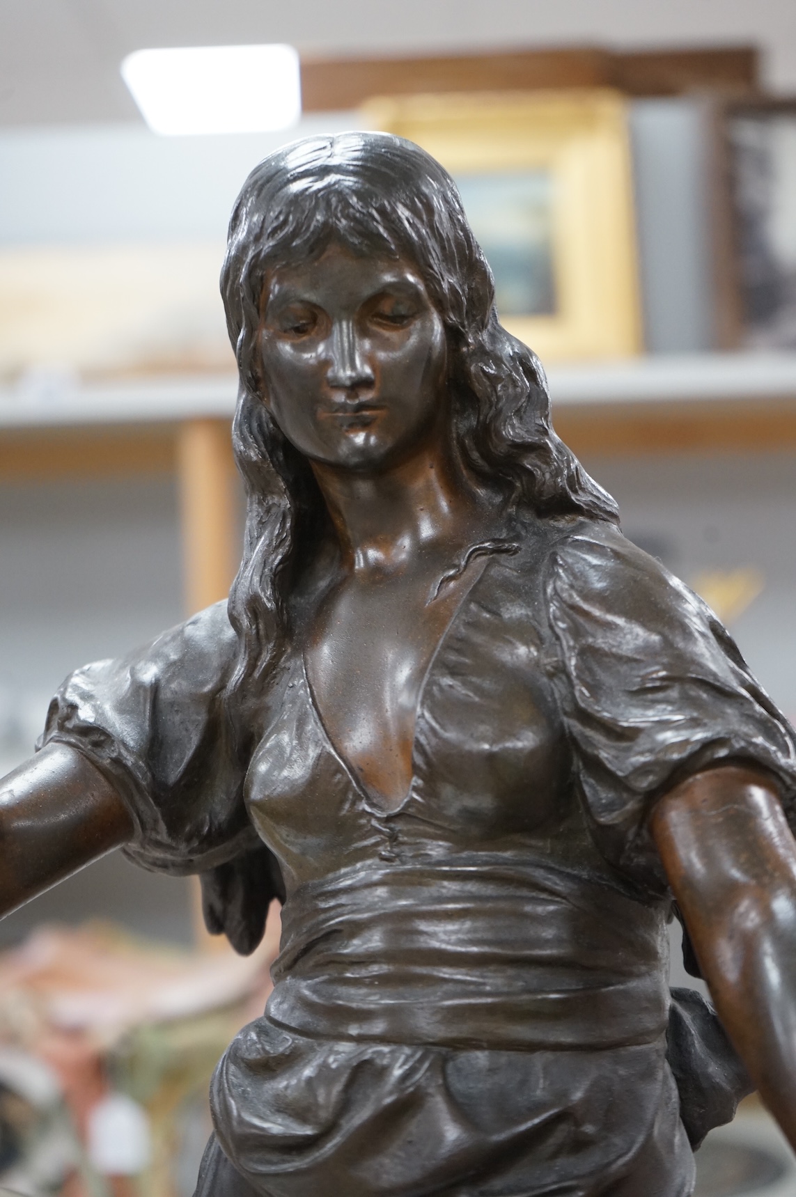 A large French patinated spelter figure of Salome, late 19th century, 75cm high